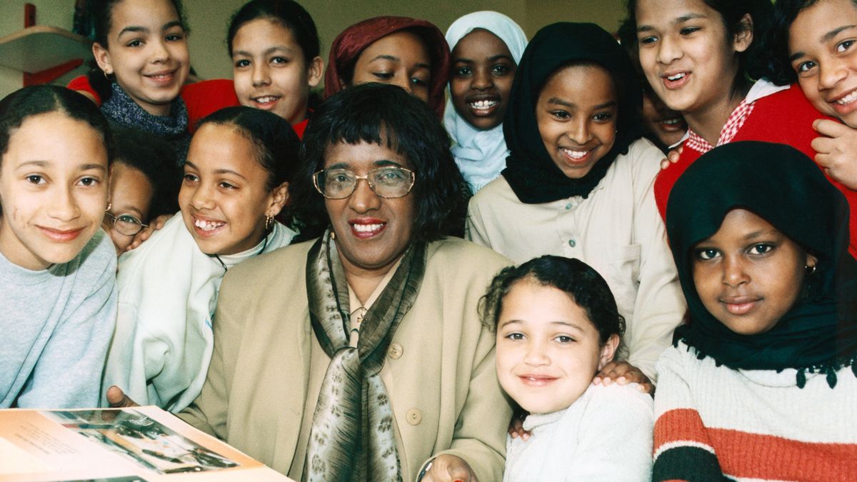 picture of black teacher with students