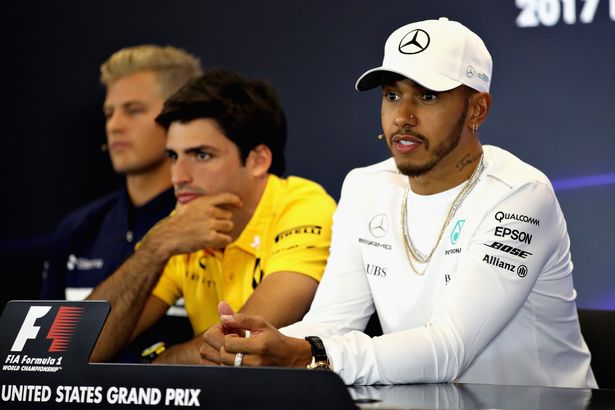 Lewis is a hugely successful racing driver, and he wants to improve diversity in the sport ( Image: Getty Images)